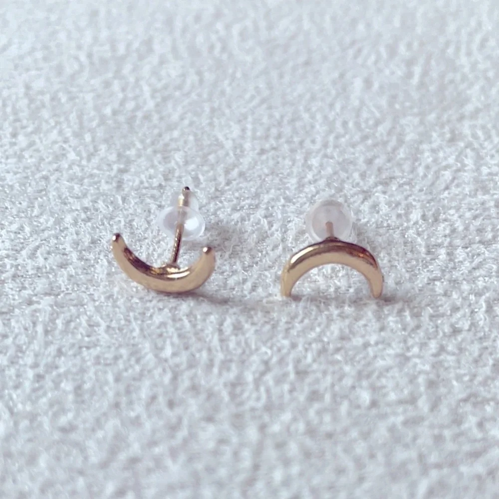 Gold crescent moon studs